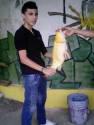 Fotos de Pesca Deportiva Pescador Sentado Feliz